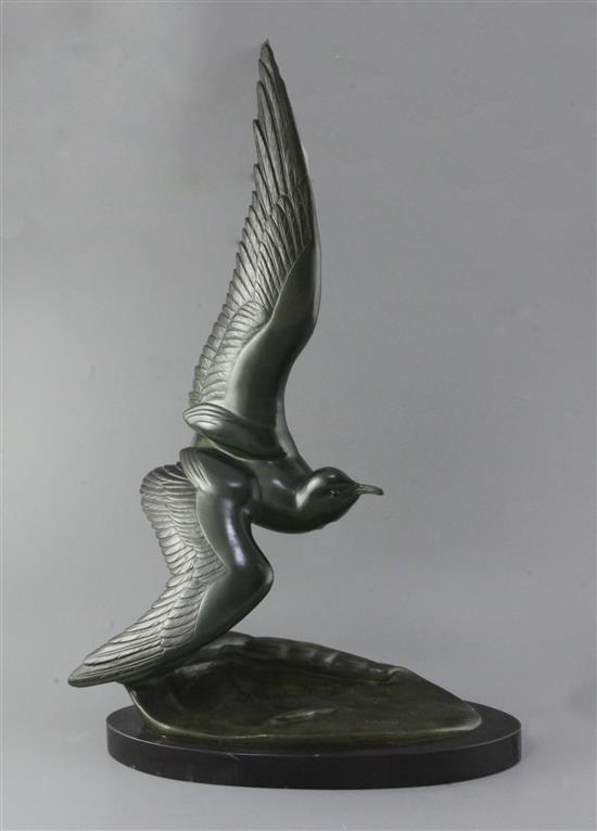 Irénée Rochard (1906-1984). A French Art Deco green patinated bronze model of a seagull flying over a wave, height 28in. Irénée Rochard (1906-1984). A French Art Deco green patinated bronze model of a seagull flying over a wave, height 28in.