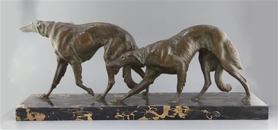 Louis Riché. A French Art Deco bronze group of two borzoi, 36in., height 13in. Louis Riché. A French Art Deco bronze group of two borzoi, 36in., height 13in.