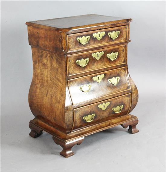 A 19th century Dutch walnut bombe commode, W.2ft D.1ft 5in. H.2ft 8in. A 19th century Dutch walnut bombe commode, W.2ft D.1ft 5in. H.2ft 8in.
