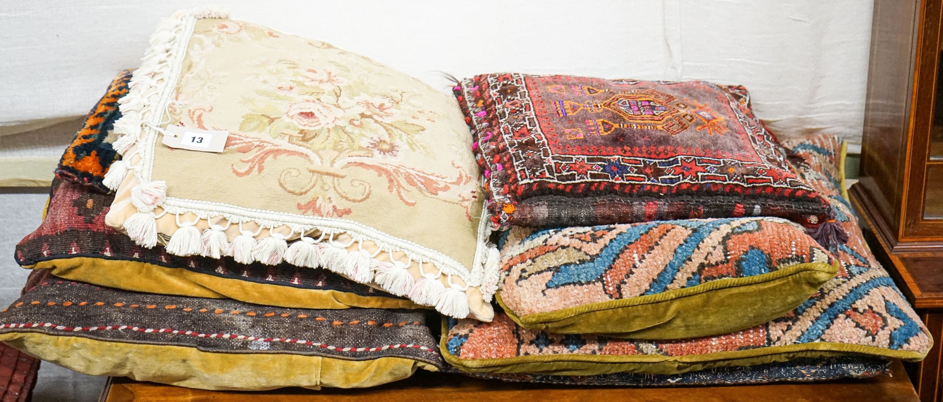 Six Caucasian, Kelim , North West Persian cushions and an Aubusson style cushion.