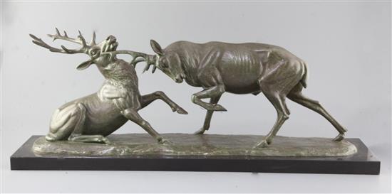 Irénée Rochard (1906-1984). A French Art Deco bronzed spelter group of two fighting stags, 29.5in. Irénée Rochard (1906-1984). A French Art Deco bronzed spelter group of two fighting stags, 29.5in.