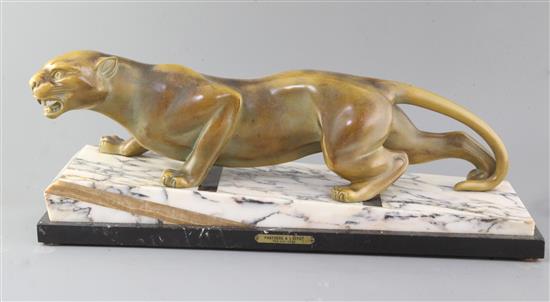 Guy Débe. A French Art Deco patinated spelter model of a crouching leopard, Panthere A LAffut, 21.5in. Guy Débe. A French Art Deco patinated spelter model of a crouching leopard, Panthere A LAffut, 21.5in.