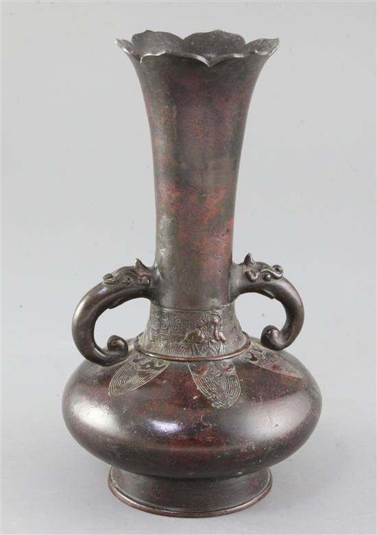 A Chinese bronze bottle vase, Song - Yuan dynasty, height 23cm, old repairs A Chinese bronze bottle vase, Song - Yuan dynasty, height 23cm, old repairs