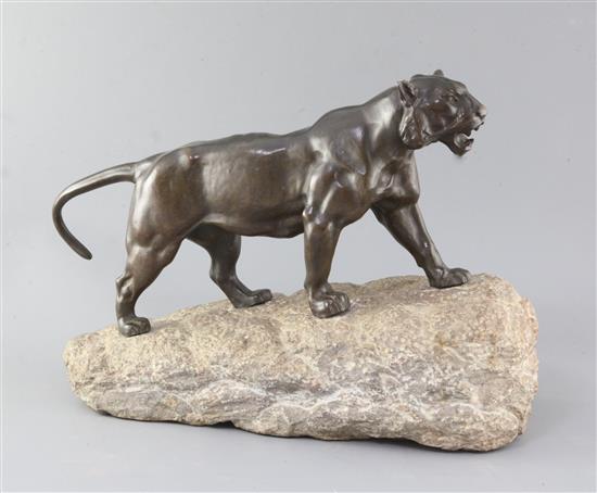 Pierre Granet (1843-1910). A French Art Deco bronze model of a tiger, height 12.5in. length 18in. Pierre Granet (1843-1910). A French Art Deco bronze model of a tiger, height 12.5in. length 18in.