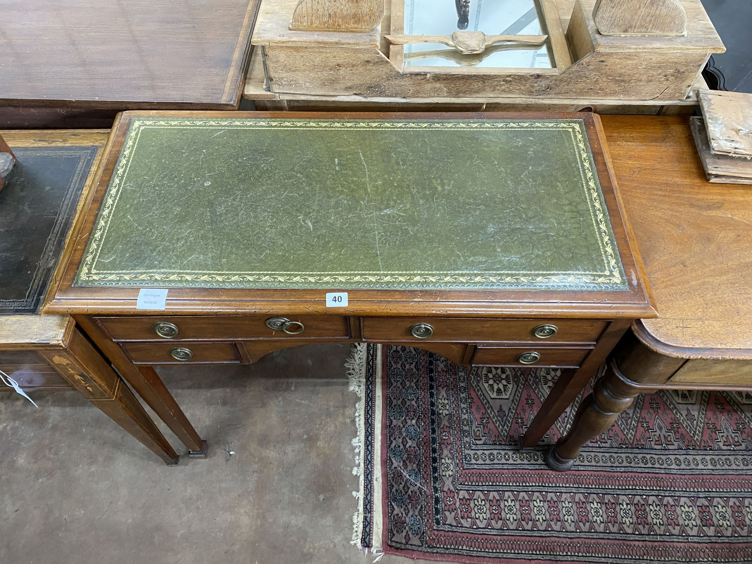 A George III mahogany kneehole writing table, width 89cm, depth 42cm, height 76cm