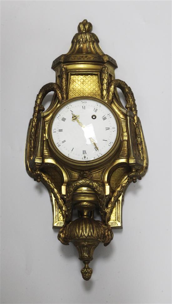 A 19th century French ormolu Cartel clock, height 27.5in. A 19th century French ormolu Cartel clock, height 27.5in.