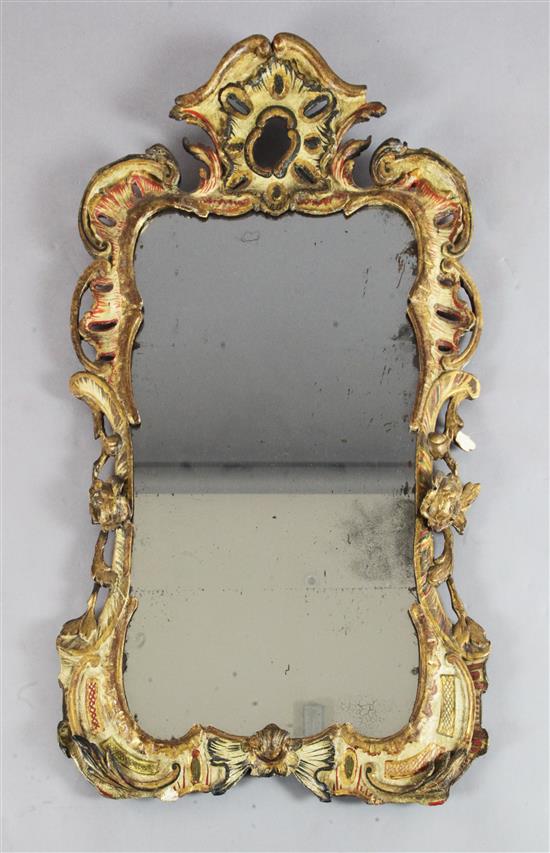 A George II carved and gilt frame looking glass, W.2ft 1.5in. H.3ft 5.5in. A George II carved and gilt frame looking glass, W.2ft 1.5in. H.3ft 5.5in.