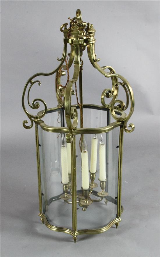A Victorian brass hall lantern, H.2ft 11in. A Victorian brass hall lantern, H.2ft 11in.