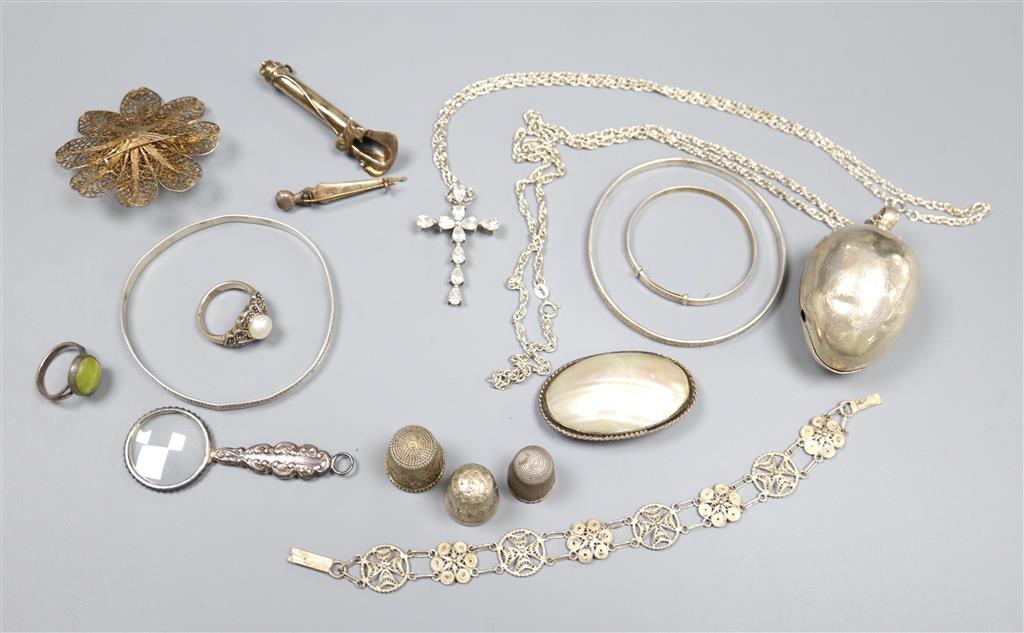 Mixed items including silver rattle, thimbles ,bangles etc.