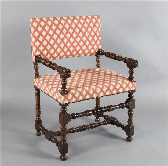 A mid 17th century French or Italian walnut armchair, A mid 17th century French or Italian walnut armchair,