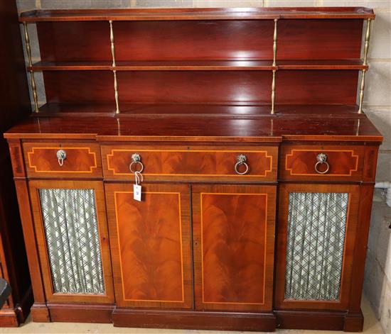 A Regency style satinwood banded mahogany breakfront secretaire cabinet, W.152cm, D.50cm, H.138cm A Regency style satinwood banded mahogany breakfront secretaire cabinet, W.152cm, D.50cm, H.138cm