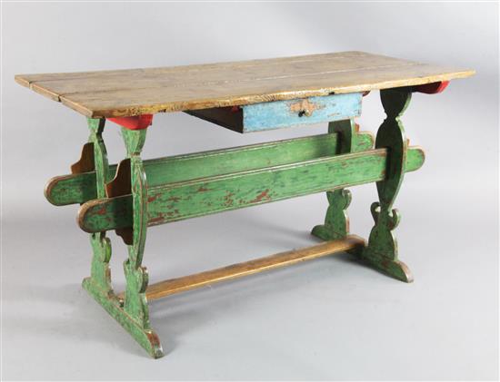 An early 18th century, possibly Scandinavian, painted pinewood table, W.4ft 9in. H.2ft 7in. An early 18th century, possibly Scandinavian, painted pinewood table, W.4ft 9in. H.2ft 7in.