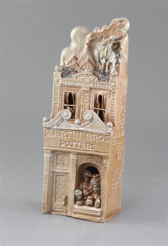 A Martinware Pottery stoneware salt glazed representation of the Martin Brothers Shop, made by Ian Gregory, 10in. A Martinware Pottery stoneware salt glazed representation of the Martin Brothers Shop, made by Ian Gregory, 10in.