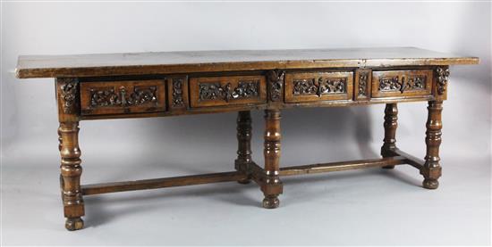 A mid 17th century Italian walnut table, L.8ft 7.5in. A mid 17th century Italian walnut table, L.8ft 7.5in.