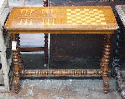 A Victorian inlaid rectangular walnut games table with chess and backgammon surface, width 87cm, depth 43cm, height 69cm