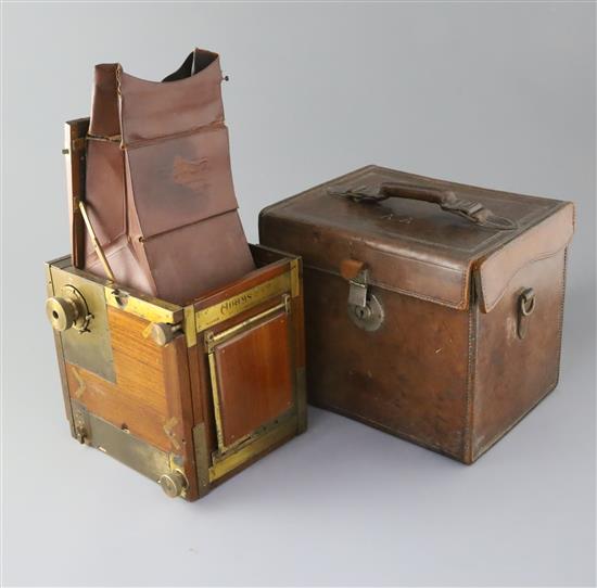 Ansel Adams (1902-1984), a rare Adams & Co. Minex De Luxe tropical mahogany and brass camera, 5 x 4in., the original leather case stamp Ansel Adams (1902-1984), a rare Adams & Co. Minex De Luxe tropical mahogany and brass camera, 5 x 4in., the original leather case stamp