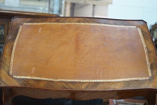 A Louis XV style rectangular kingwood leather topped low occasional table, length 69cm, depth 42cm, height 50cm