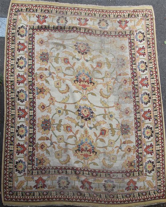 An Indian carpet of Ziegler style, 14ft 5in. x 11ft 2.5in. (badly worn) An Indian carpet of Ziegler style, 14ft 5in. x 11ft 2.5in. (badly worn)