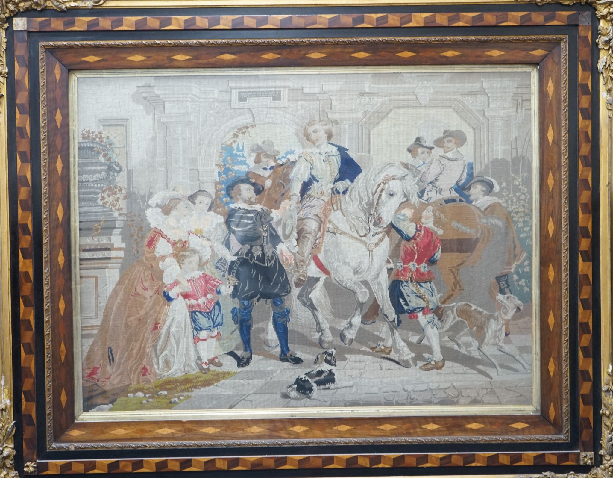 A 19th century Berlin tapestry panel in cubed parquetry and gilt gesso frame, width 146cm, height 120cm