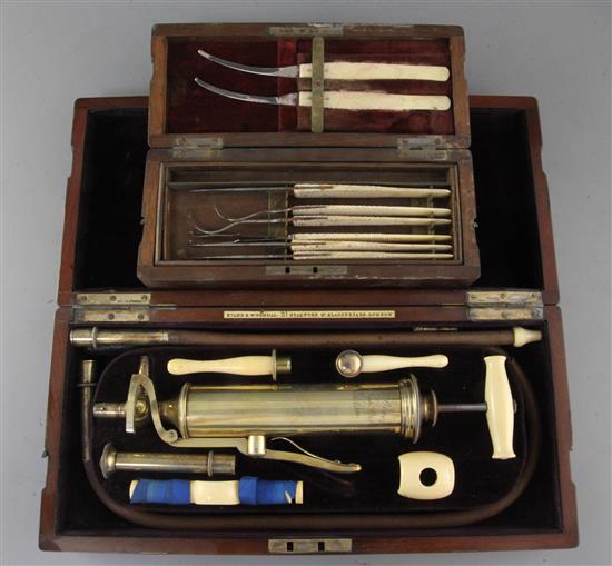 An Evans & Wormull ivory and brass medical pump, in original fitted case, 8.5in. An Evans & Wormull ivory and brass medical pump, in original fitted case, 8.5in.
