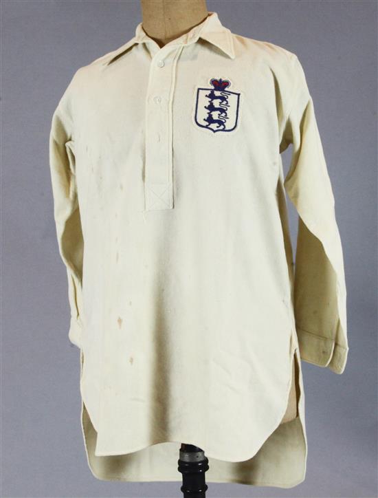 England Football Interest: A Frank Roberts white England International jersey, season 1924-25, some spotting otherwise good condition England Football Interest: A Frank Roberts white England International jersey, season 1924-25, some spotting otherwise good condition