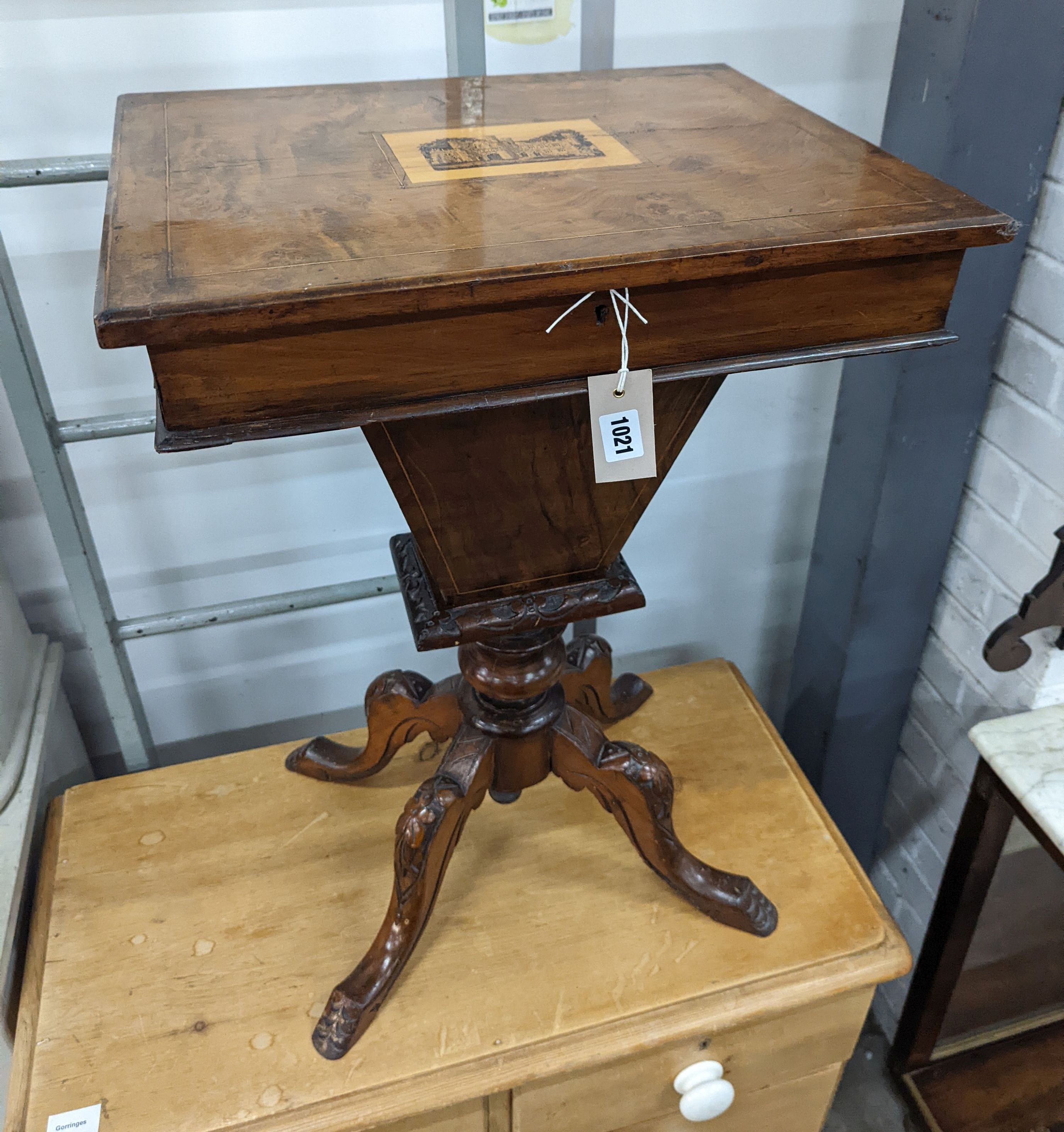 A Victorian walnut trumpet work table, the hinged top inset with a Tunbridge inlaid view of Eridge Castle, width 49cm, depth 38cm, height 72cm