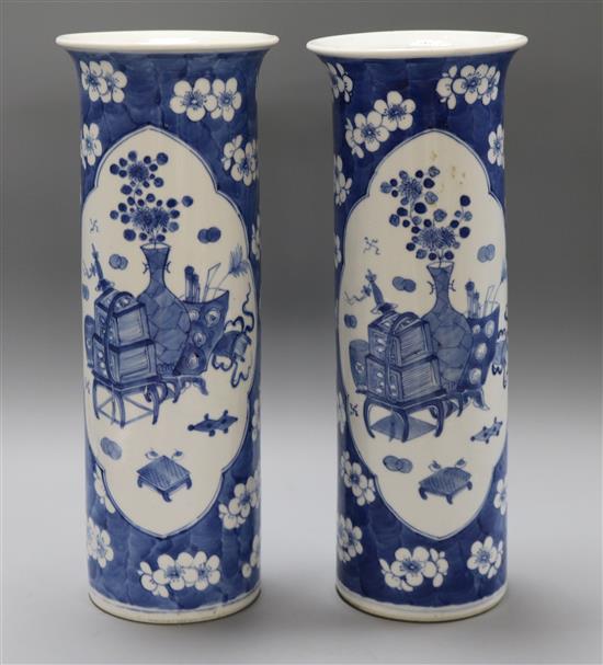A pair of Chinese blue and white sleeve vases, 19th century height 36cm A pair of Chinese blue and white sleeve vases, 19th century height 36cm