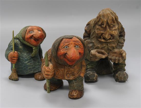 Three carved wooden trolls tallest 19cm Three carved wooden trolls tallest 19cm