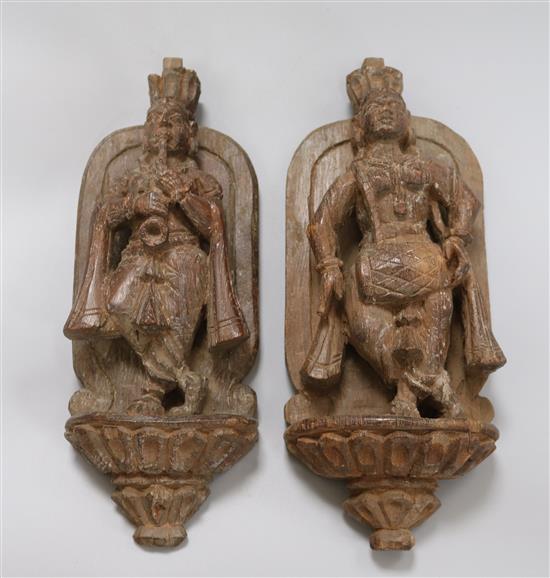 Two 19th century hand carved Indian statuettes height 29cm Two 19th century hand carved Indian statuettes height 29cm