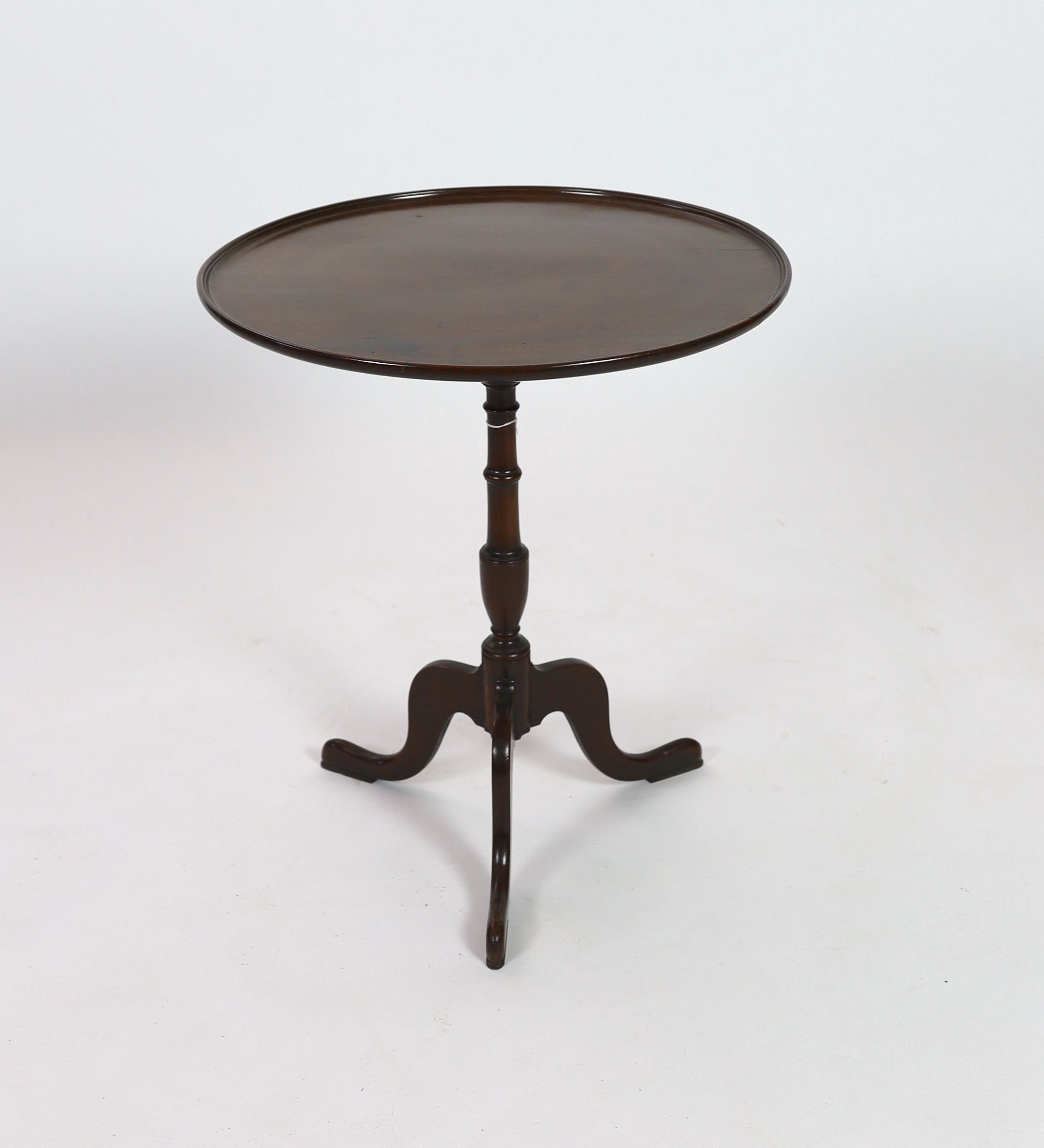 A George III circular mahogany tilt top tripod tea table, diameter 61cm height 70cm