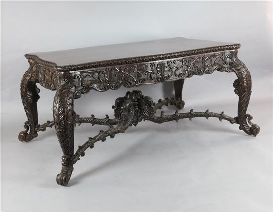 A 19th century Burmese hardwood centre or library table, W.5ft 10in. D.3ft 8in. H.2ft 6in. A 19th century Burmese hardwood centre or library table, W.5ft 10in. D.3ft 8in. H.2ft 6in.