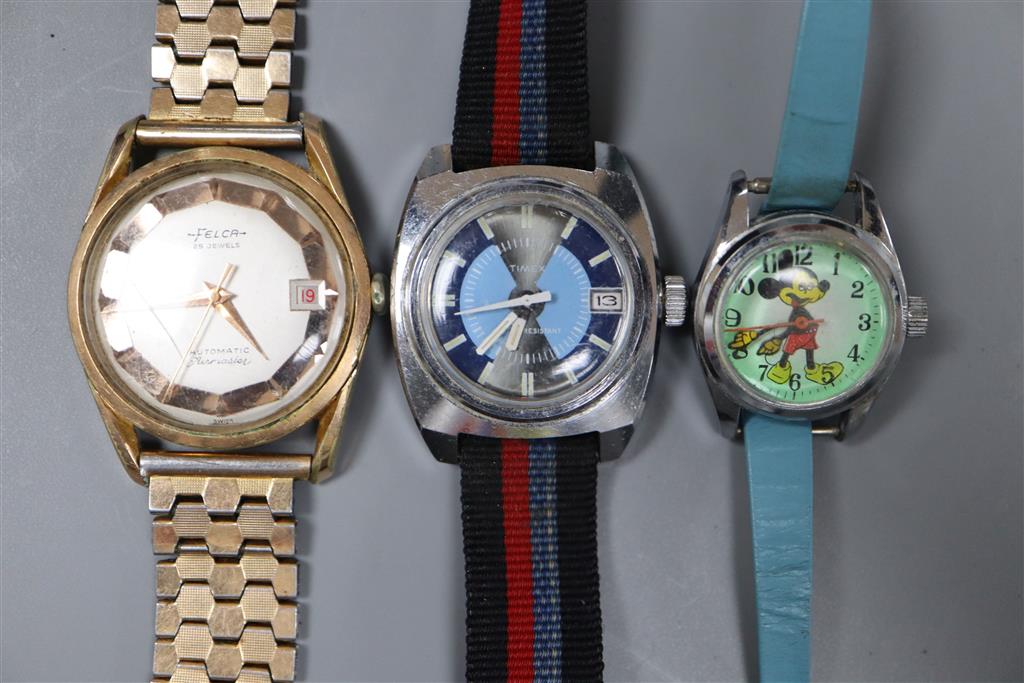 Three assorted wrist watches including Felca, Timex and ladys Mickey Mouse.