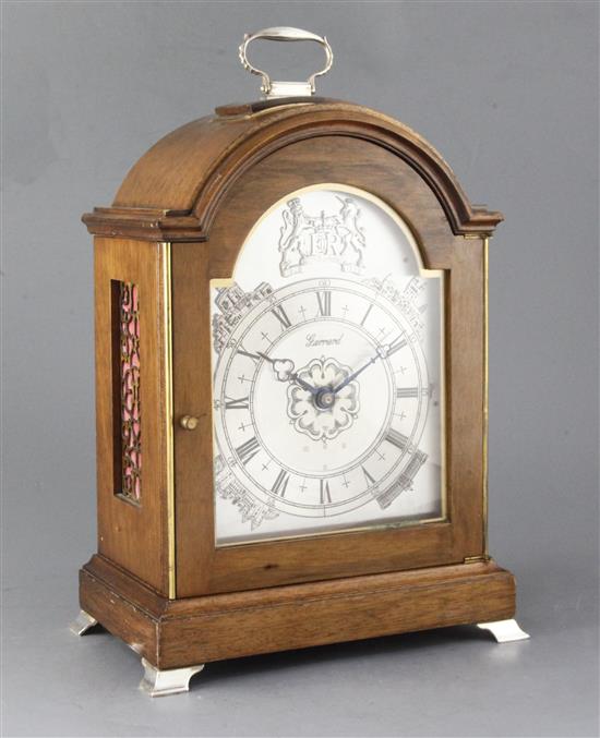 A silver mounted mahogany quarter chiming table clock, by J.W. Elliott Ltd for Garrard, 15in. A silver mounted mahogany quarter chiming table clock, by J.W. Elliott Ltd for Garrard, 15in.