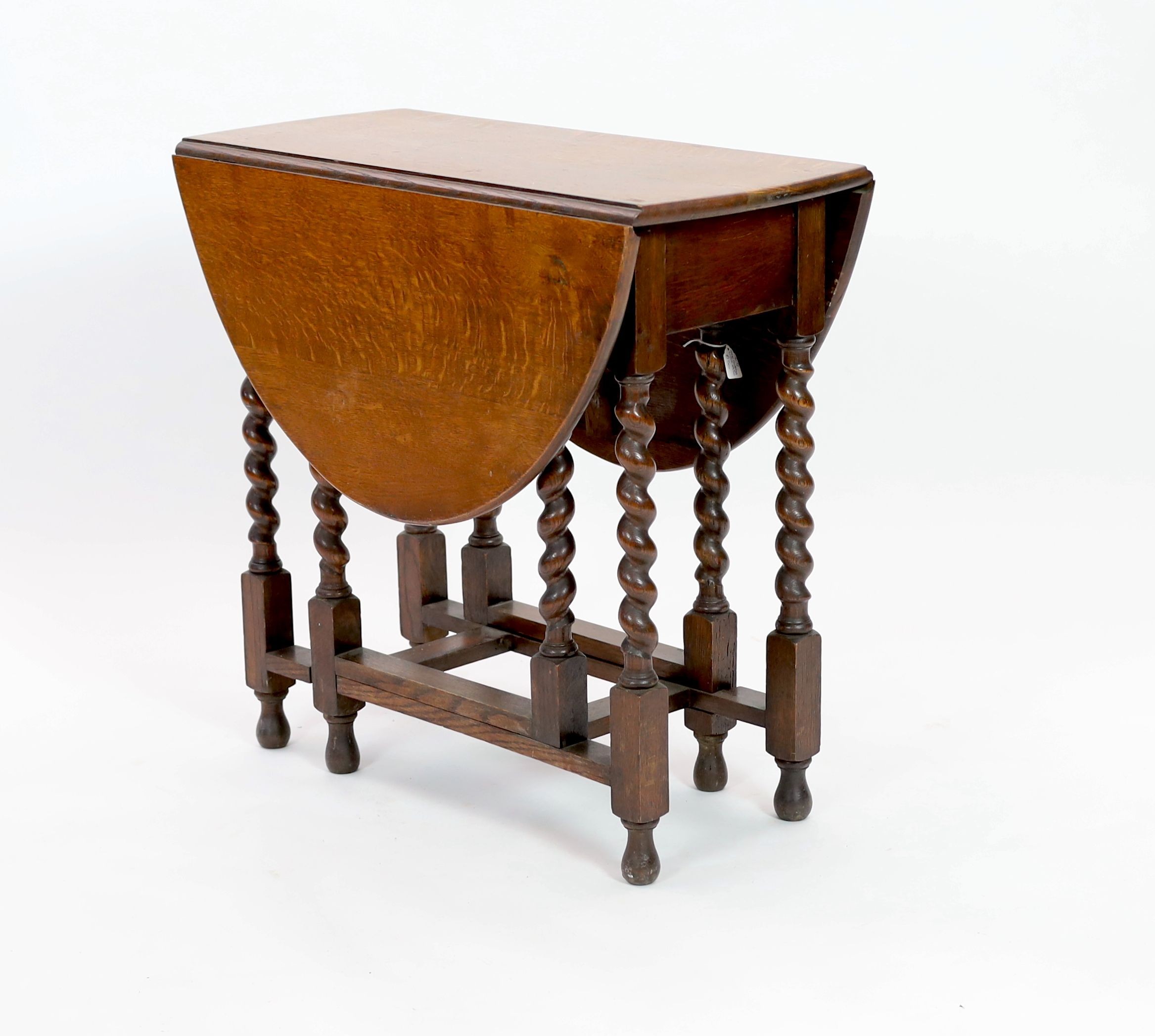 A small early 20th century oak gateleg table, on spiral turned legs, width 77cm depth 37cm height 74cm