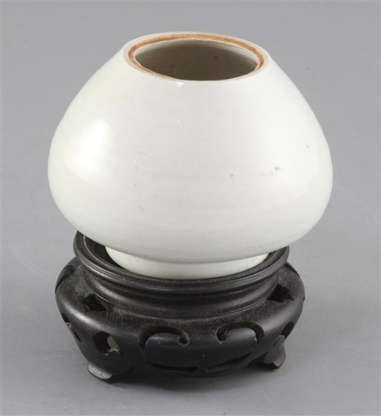 A Chinese Qingbai bud shaped vase, probably Yuan dynasty, height 7cm, wood stand A Chinese Qingbai bud shaped vase, probably Yuan dynasty, height 7cm, wood stand