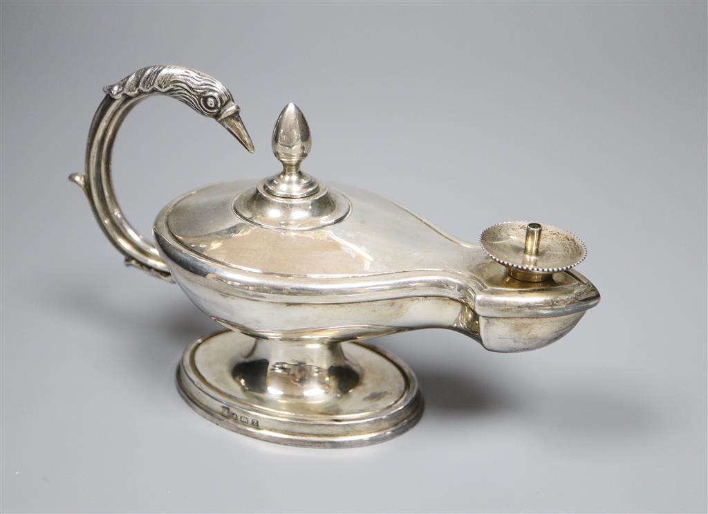 A late Victorian silver Aladdins Lamp cigar table lighter, A & J Zimmerman, Birmingham, 1899, height 9.8cm, gross 4oz.