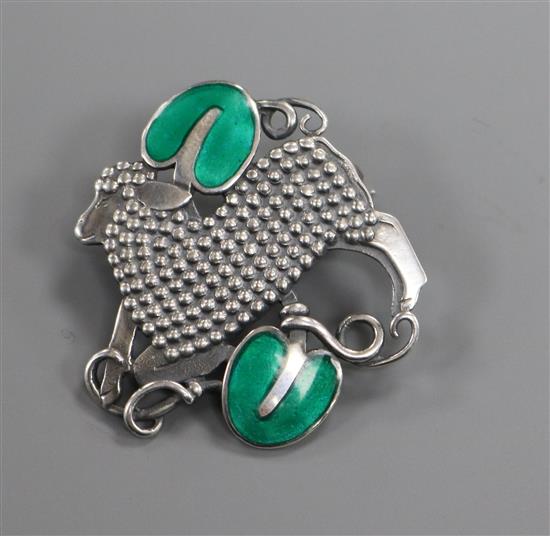 A Danish Georg Jensen sterling silver and enamel sheep brooch, no 284, 33mm. A Danish Georg Jensen sterling silver and enamel sheep brooch, no 284, 33mm.