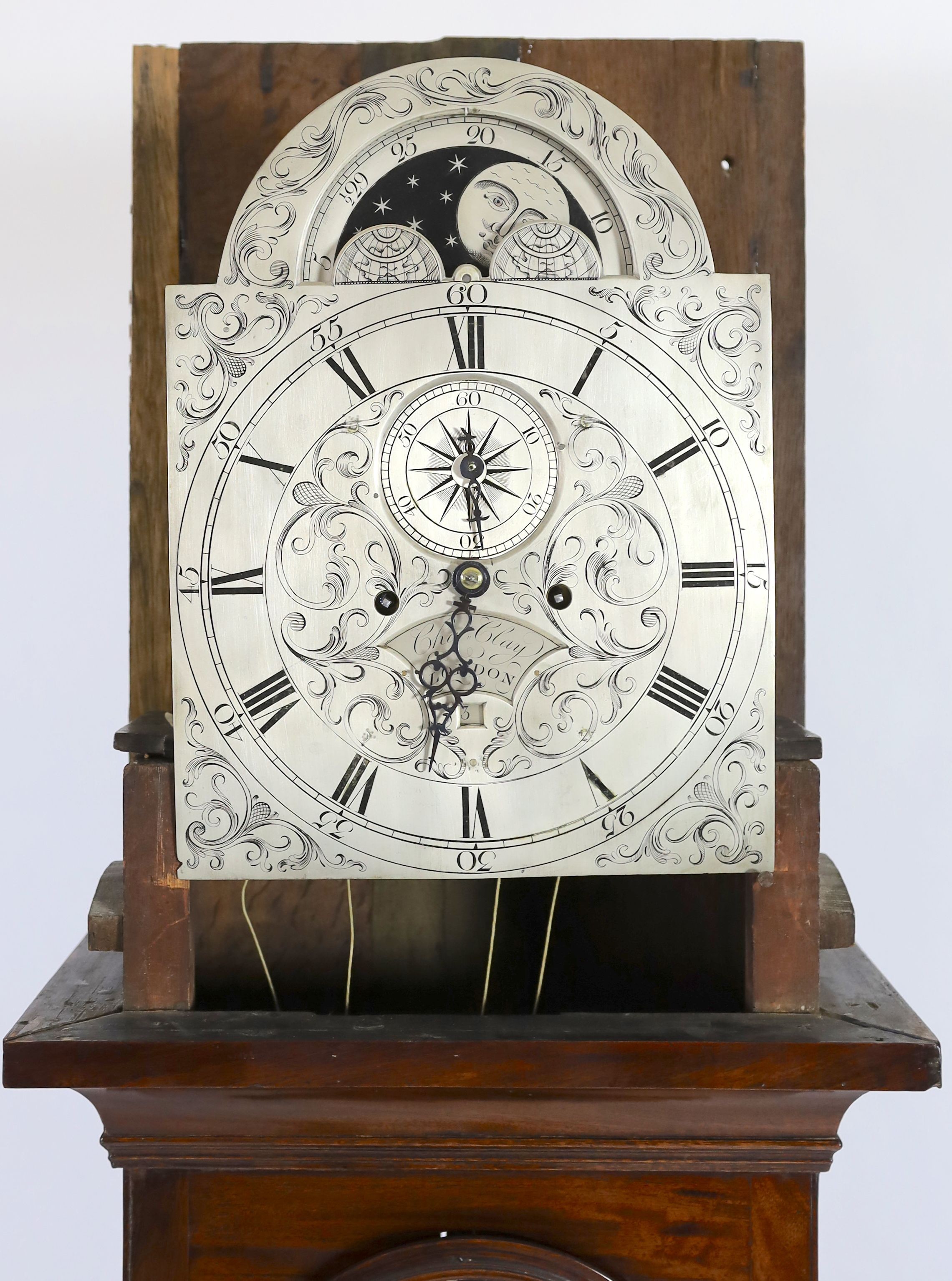 A George III mahogany cased eight day longcase clock, by Charles Clay, London, the 30cm arched silvered dial with moonphase, subsidiary seconds and calendar aperture, height 224cm