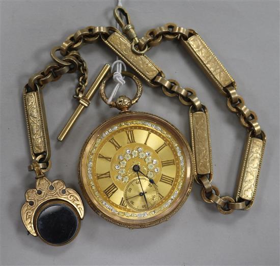 An engraved 14ct gold pocket watch and a fancy gilt metal albert with spinning fob.