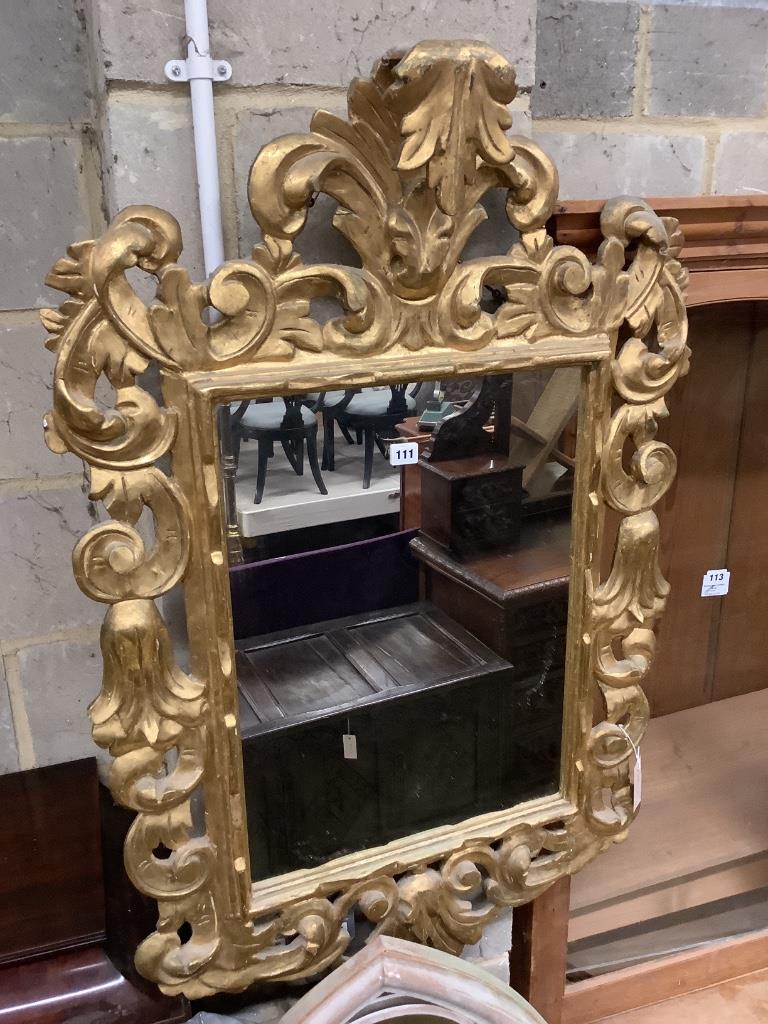 An 18th century style carved giltwood wall mirror, width 75cm height 110cm