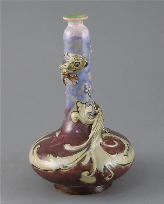 Mark V Marshall for Doulton lambeth, a flambe bottle vase entwined by a mythical beast, c.1885, 19cm, restored Mark V Marshall for Doulton lambeth, a flambe bottle vase entwined by a mythical beast, c.1885, 19cm, restored