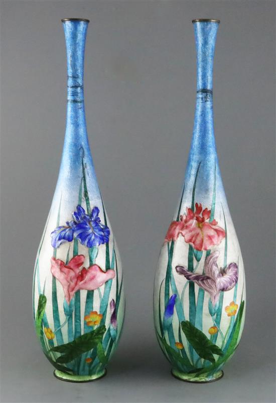 A pair of large Japanese ginbari cloisonne enamel bottle vases, c.1910, vases H.61.5cm, some cracks to enamel A pair of large Japanese ginbari cloisonne enamel bottle vases, c.1910, vases H.61.5cm, some cracks to enamel
