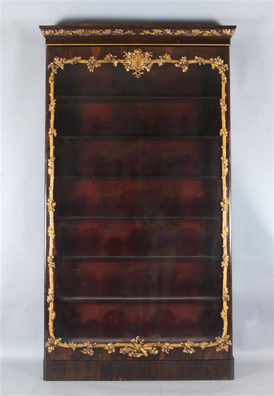 A Victorian rosewood and holly wall mounted display cabinet, mid 19th century, W.4ft 6in. A Victorian rosewood and holly wall mounted display cabinet, mid 19th century, W.4ft 6in.