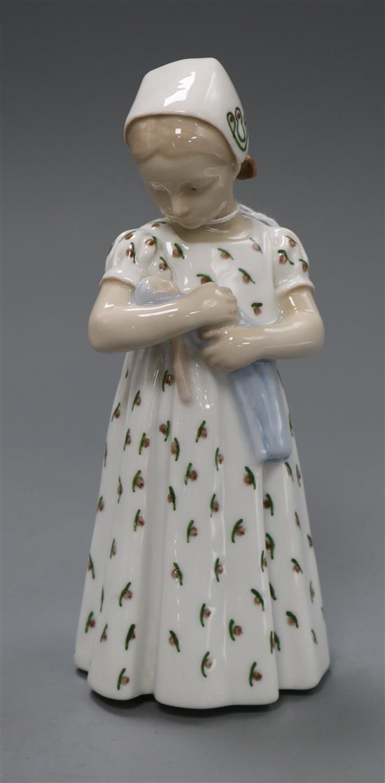A Bing and Grondahl figure of a girl holding a baby height 19cm