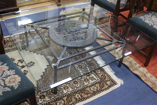 A modern wrought iron coffee table with glass top W.130cm A modern wrought iron coffee table with glass top W.130cm