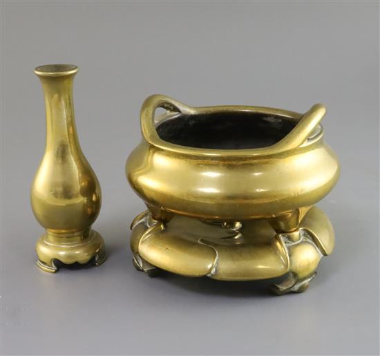A Chinese polished bronze censer with stand and a similar bottle vase, 17th/18th century, censer 16cm diameter, vase 15.5cm high