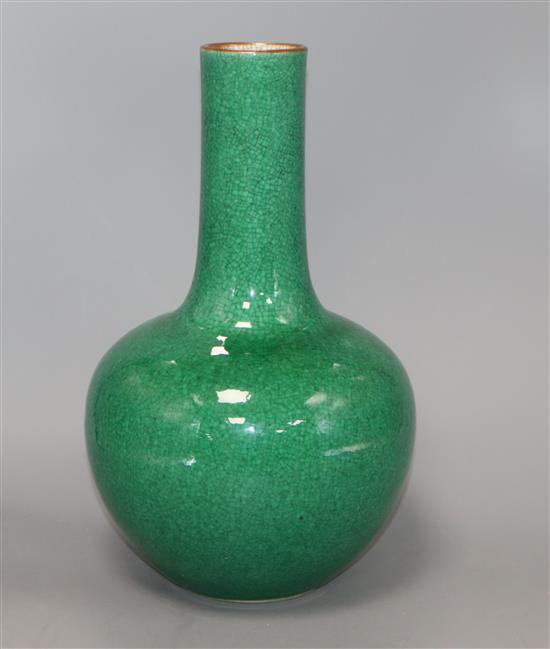 A Chinese bottle-shaped apple green crackle-glazed vase, H 32cm A Chinese bottle-shaped apple green crackle-glazed vase, H 32cm