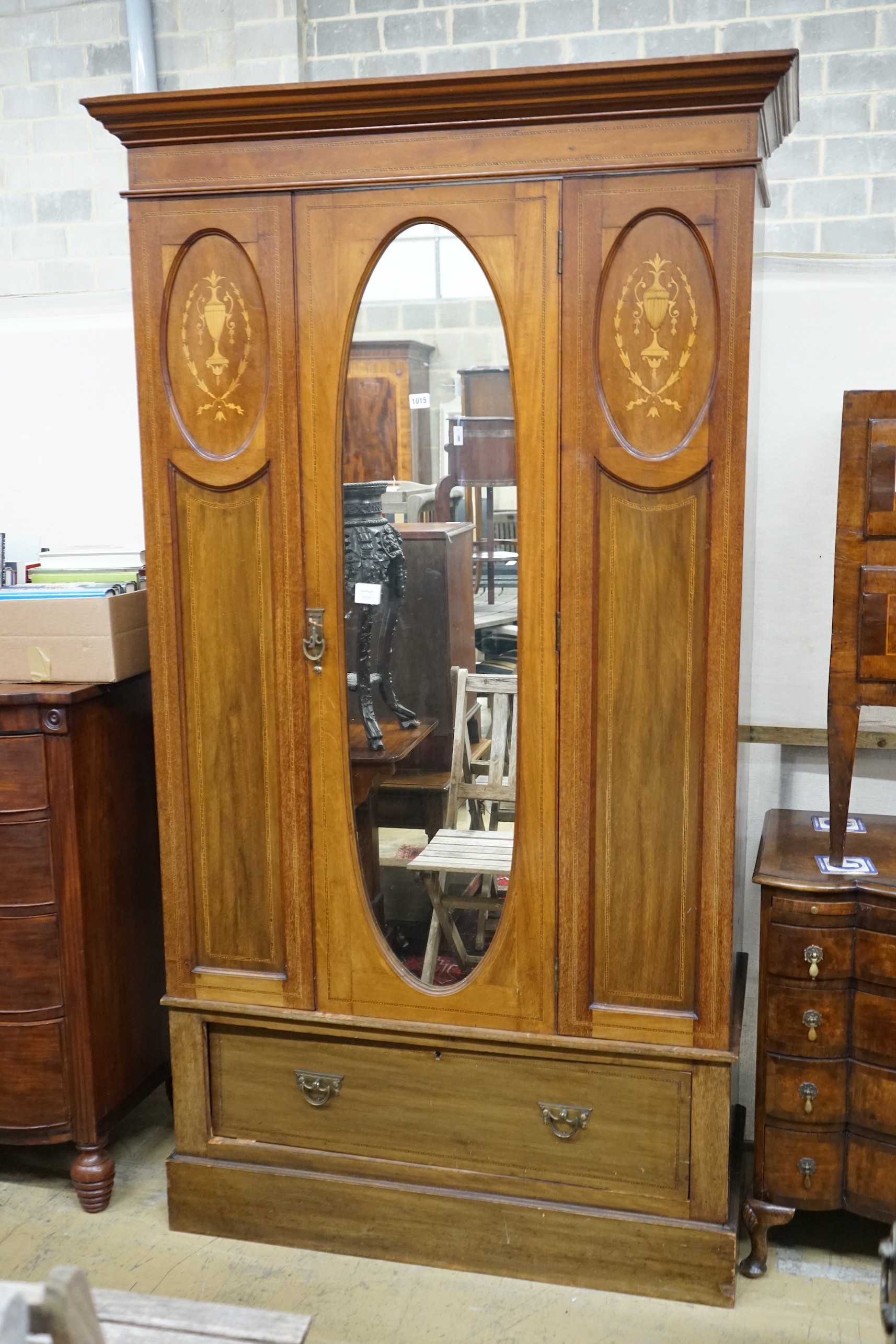 An Edwardian inlaid mahogany wardrobe, width 114cm, depth 48cm, height 204cm