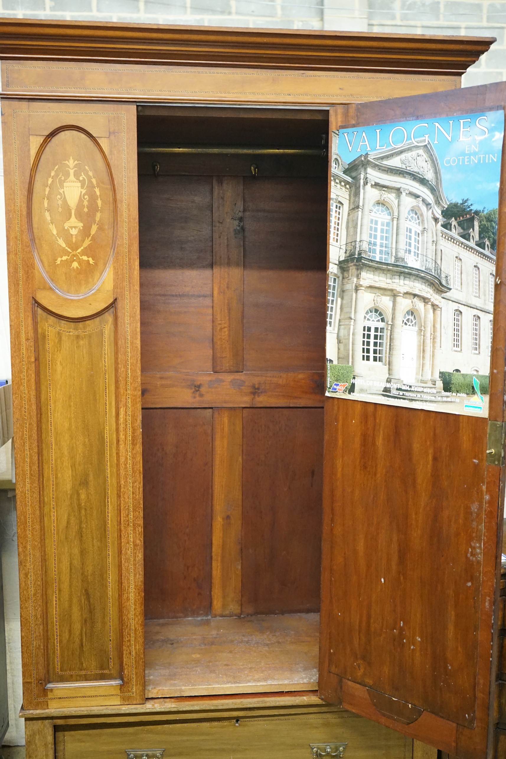 An Edwardian inlaid mahogany wardrobe, width 114cm, depth 48cm, height 204cm
