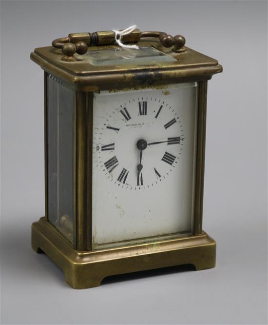 A French gilt brass carriage clock, white enamelled Roman dial, height 11cm A French gilt brass carriage clock, white enamelled Roman dial, height 11cm